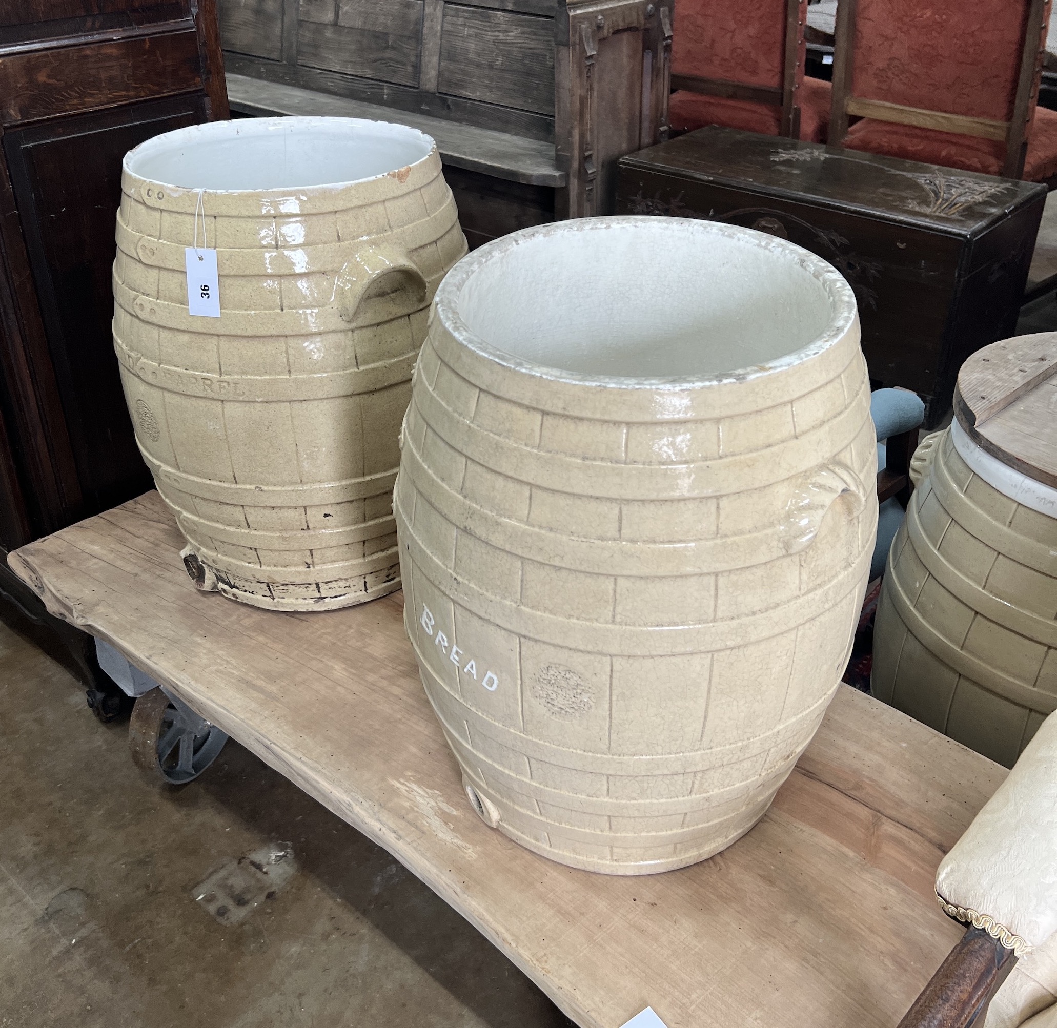 Two Victorian glazed earthenware bread barrels, diameter 42cm, height 53cm